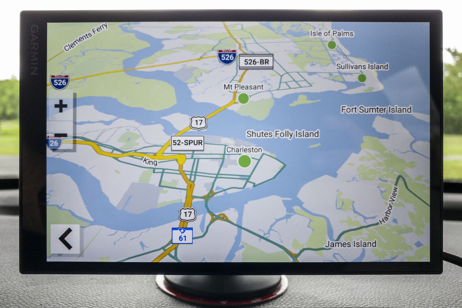 Garmin SmartDrive 76 GPS device mounted on vehicle dashboard. This is one of the best GPS for road trips